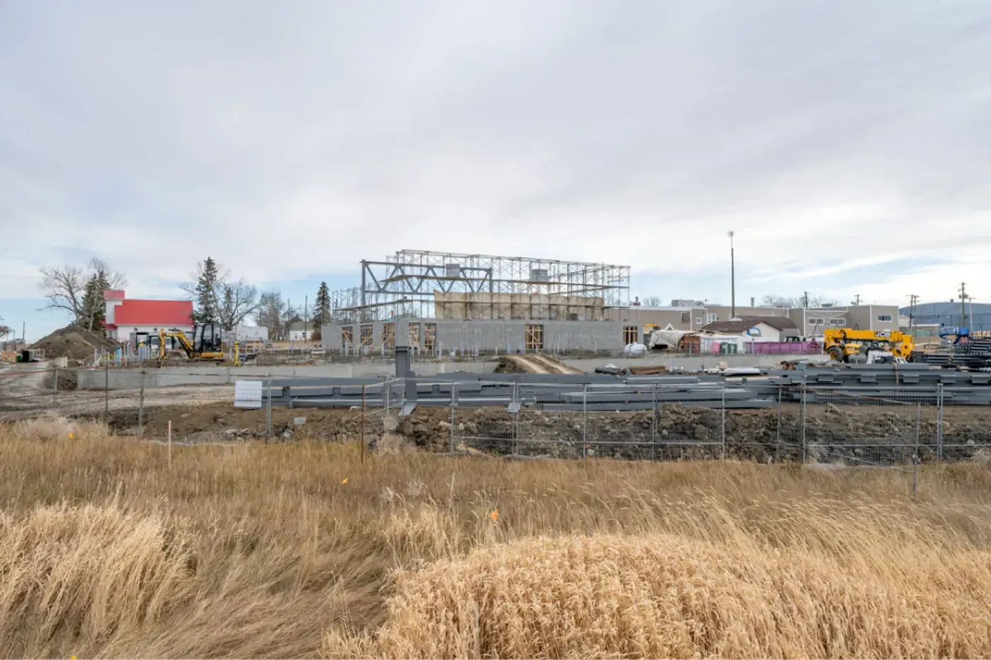 Commercial steel frame construction site early stage alberta